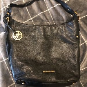 Michael Kors black leather handbag